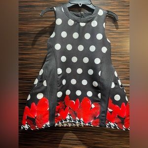 Black polka dot and red butterfly dress